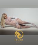 Stripper Madrid show erótico — bailarina bodysuit blanco encaje 2026