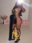 Show stripper nocturno Madrid — bailarina bodysuit negra animal print